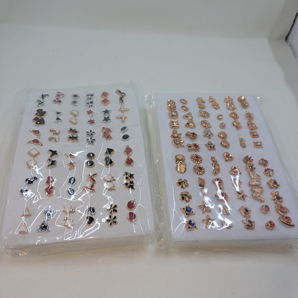 72 gold and silver earrings brand new metal